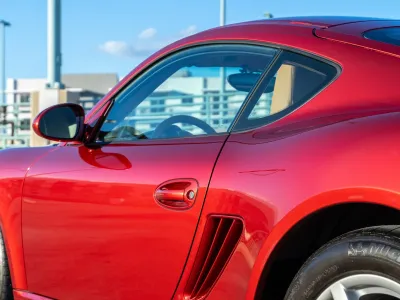 2009 Porsche Cayman in Ruby Red Metallic